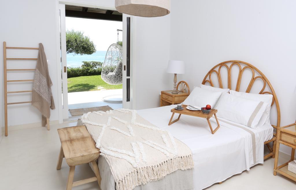 Seafront Calista Beach House With Garden Glifada Eksteriør billede